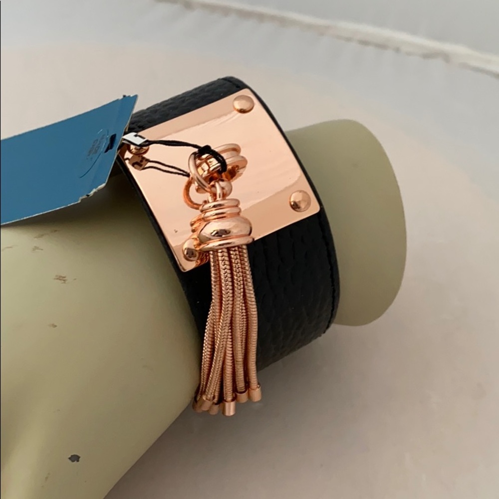 Gold Tone tassel on faux leather bracelet